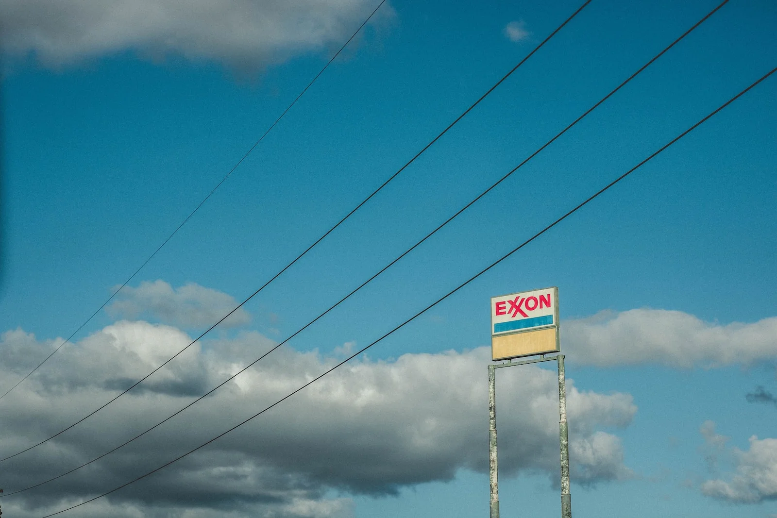 red and white stop sign under blue sky during daytime